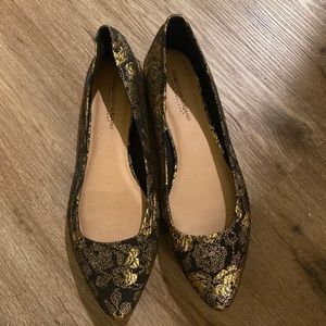 Black and gold flats
